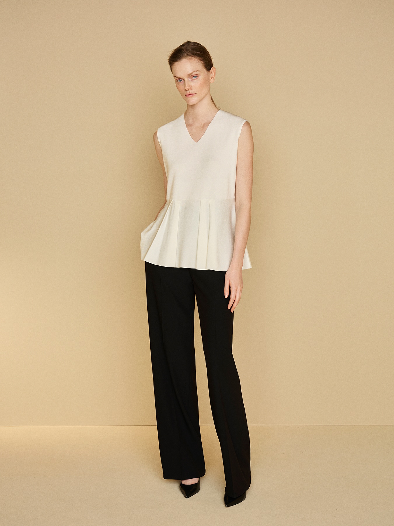 Vネックペプラムニットジレ